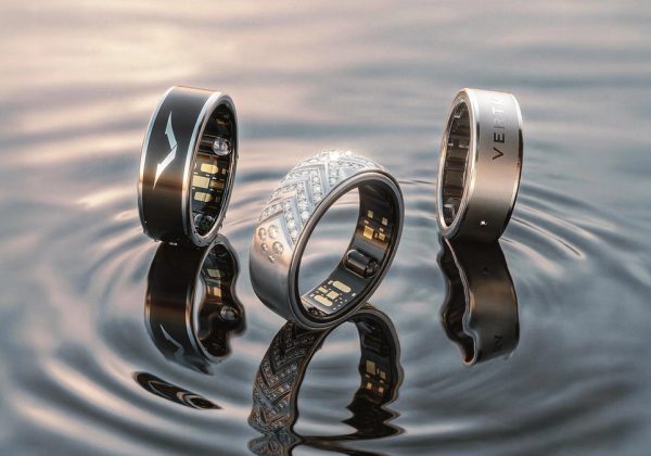Three VERTU AI Aura Rings on water — black, diamond pavé, and silver — official product photography for the Care Five-Piece Set