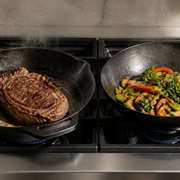Cast Iron vs Carbon Steel Skillet shown in a practical side-by-side comparison