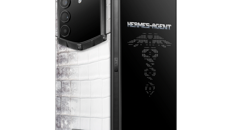 A VERTU phone showcasing the seamless integration of exotic leather and polished metal frame.