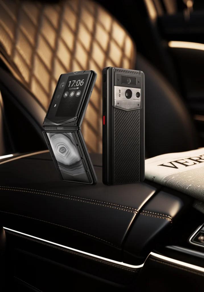 A person holding a smartphone, taking a photo of a detailed object, highlighting the camera's capability.