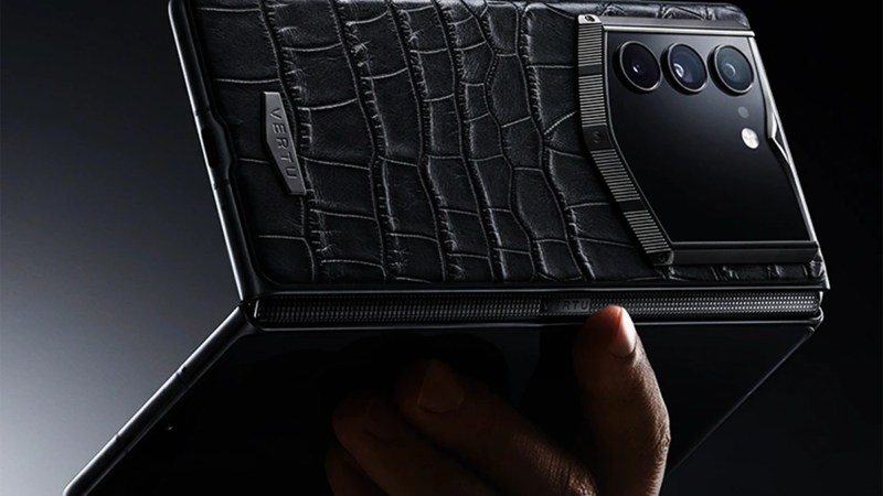 A luxury smartwatch displaying a complex, artistic watch face.