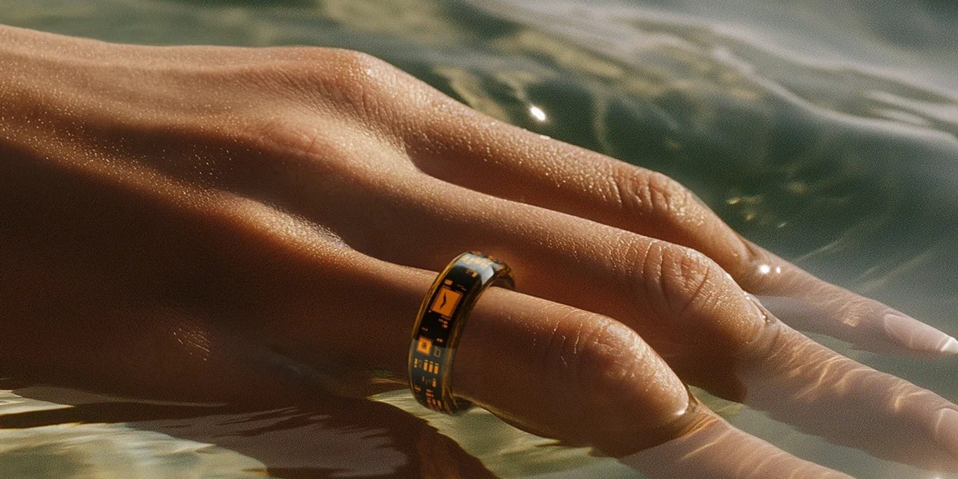 A close-up of a high-end smart ring showing intricate metalwork and design.