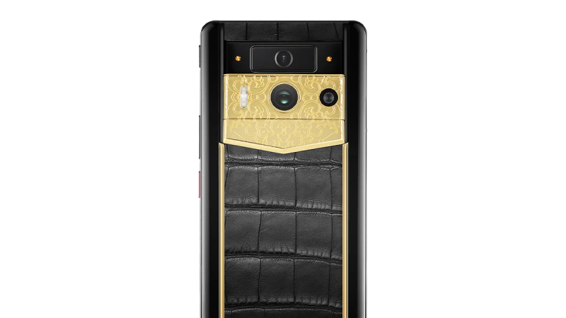 The side profile of a Vertu Signature V, showing the solid gold SIM drawer mechanism.