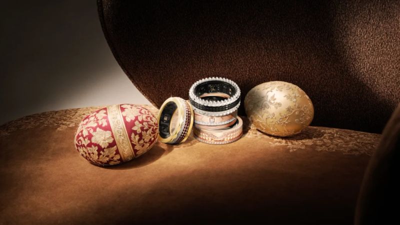 A close-up of a luxury smart ring showcasing its polished metallic finish and intricate design details.
