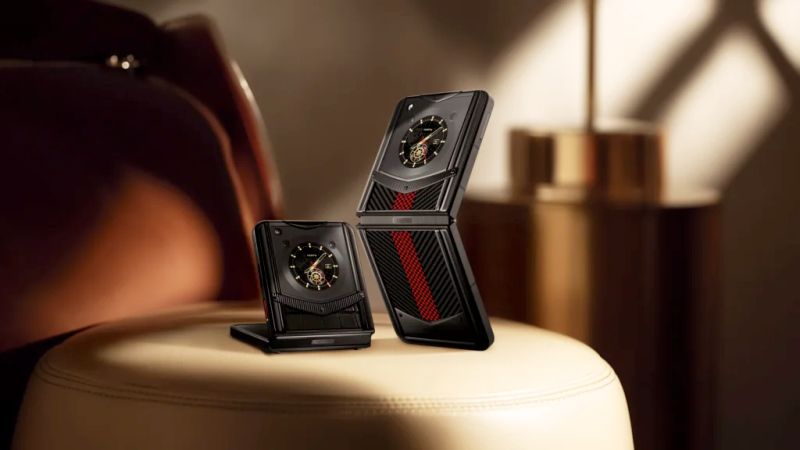 A close-up of the intricate hinge mechanism on the Vertu Quantum Flip phone.