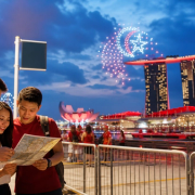 Visitors arriving at Singapore National Stadium with transit, weather and crowd-planning cues