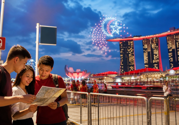 Visitors arriving at Singapore National Stadium with transit, weather and crowd-planning cues