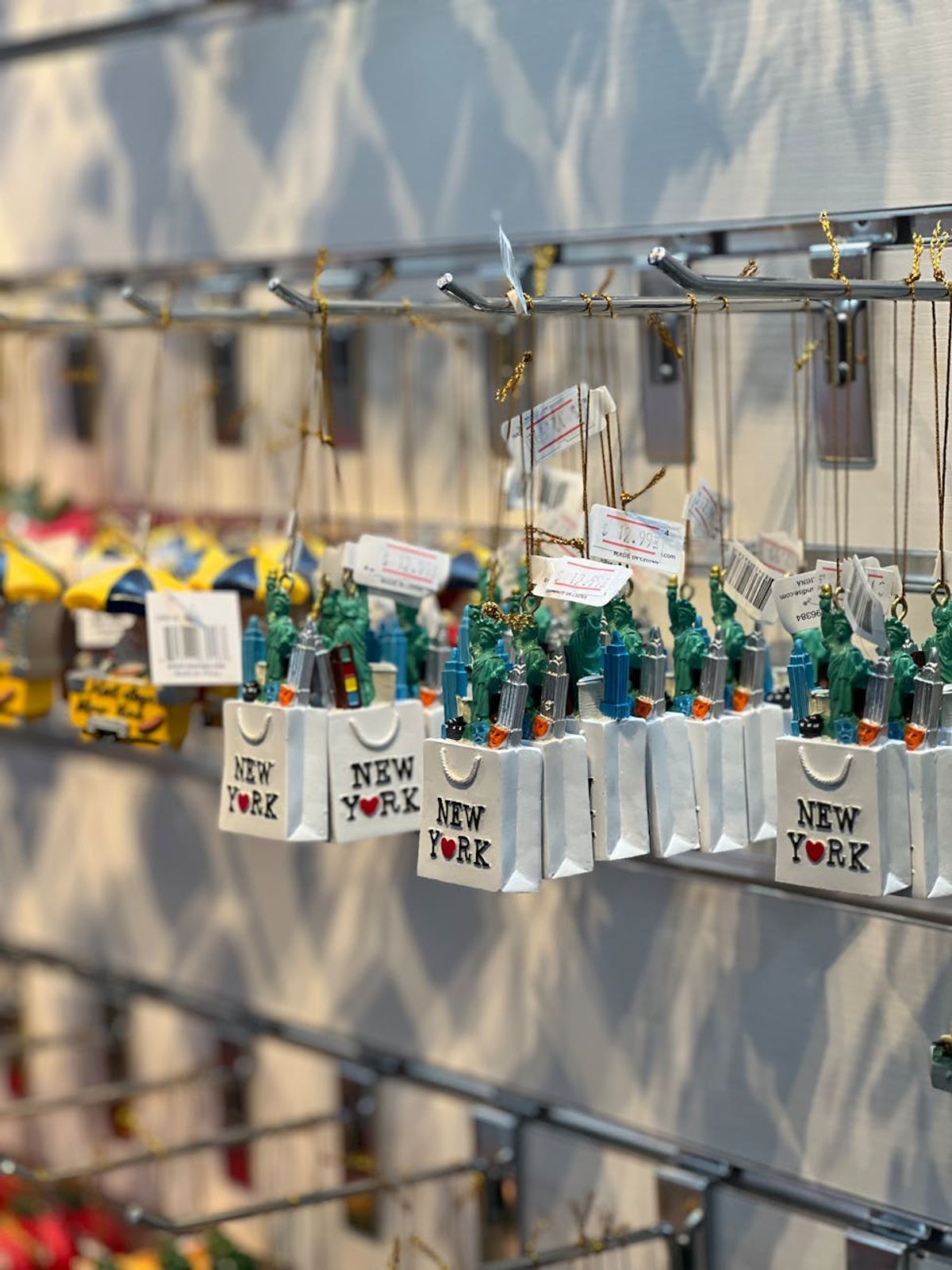 Colorful New York ornaments neatly displayed, capturing the essence of city souvenirs.
