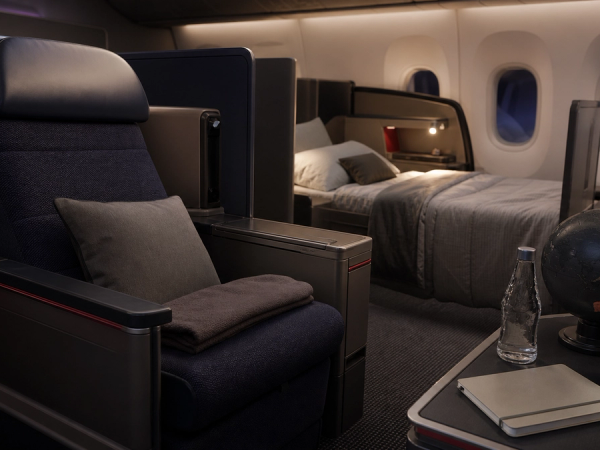 Premium economy recliner and business bed compared for an ultra-long-haul Australia flight