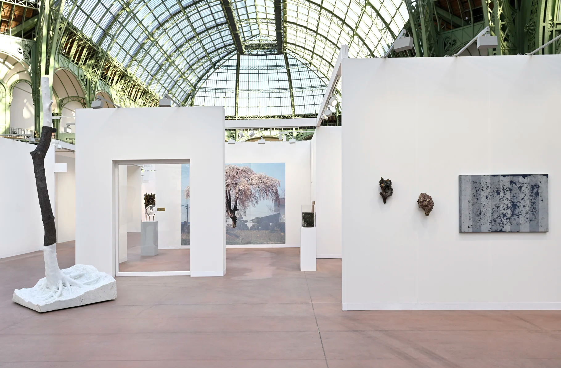 Exhibition beneath a glass-vaulted roof
