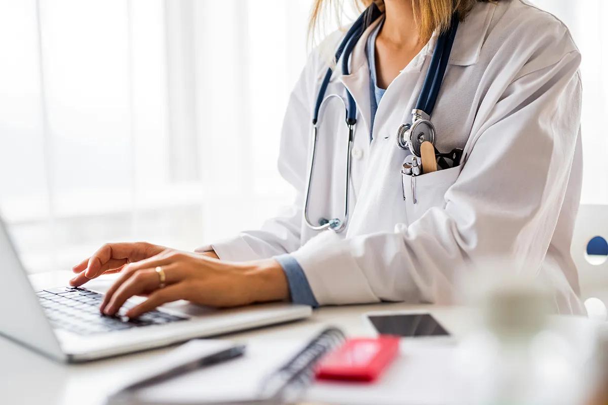 Woman doctor on computer