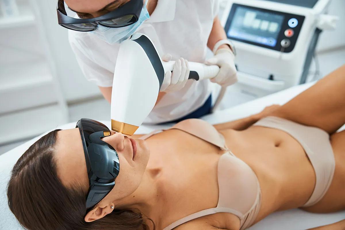 Woman having laser treatment