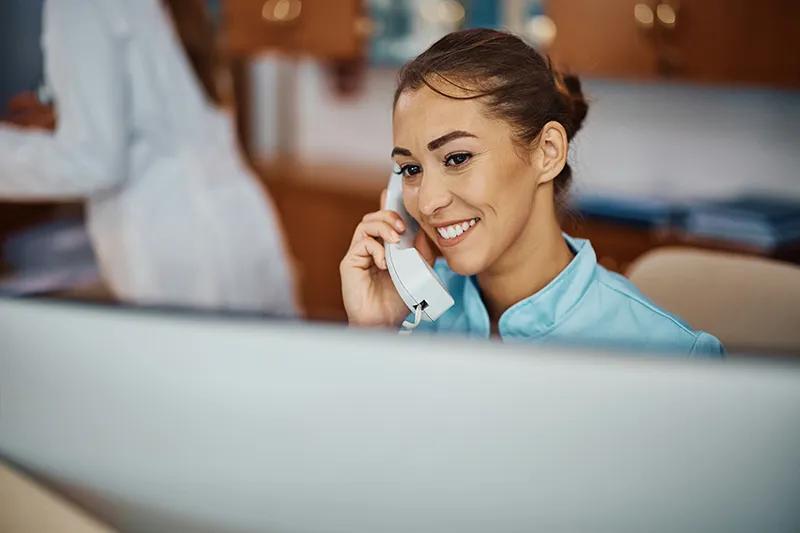 Receptionist on phone