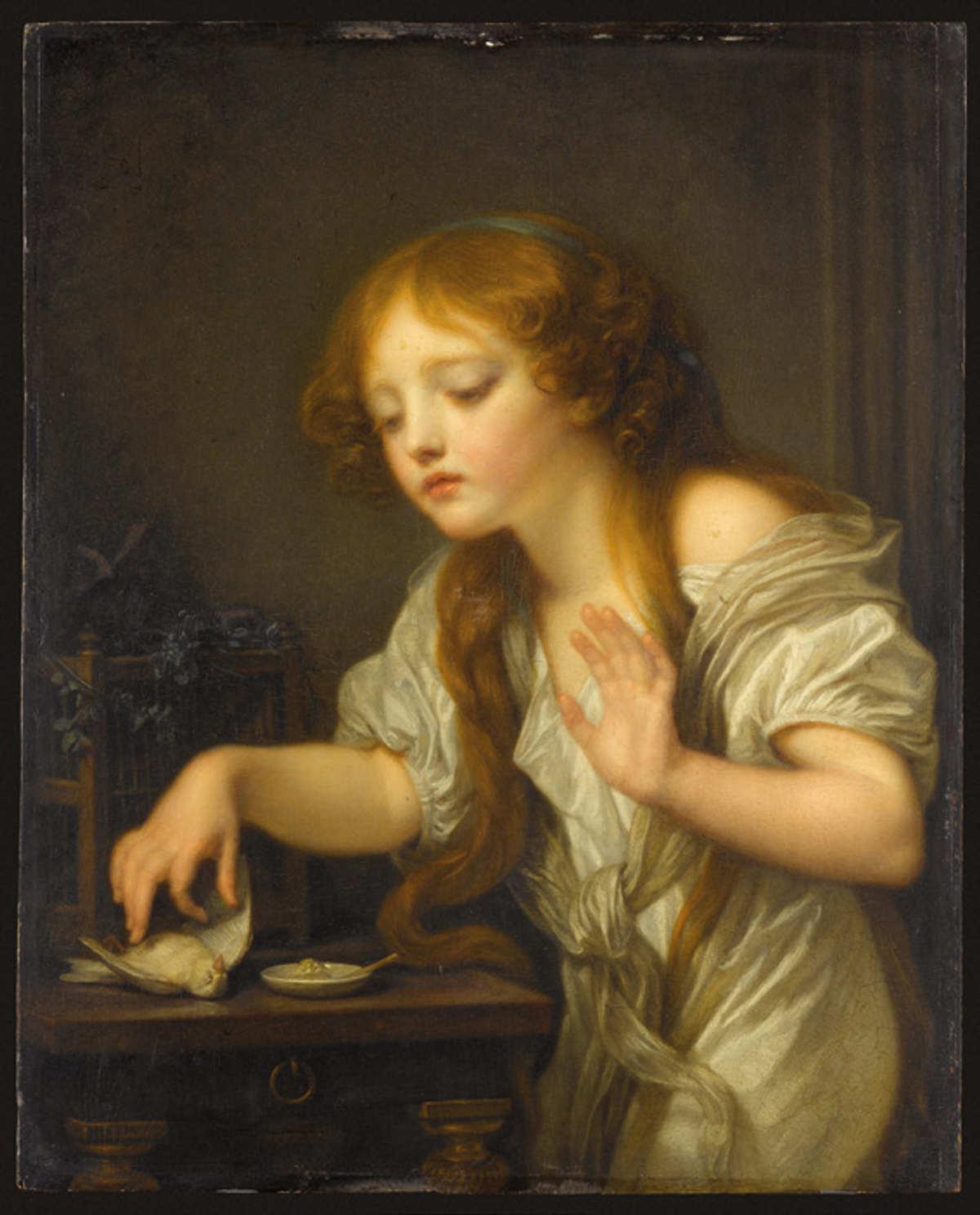 Jean-Baptiste Greuze, L’Oiseau mort, dit aussi Un enfant hésitant à toucher un oiseau dans la crainte qu’il ne soit mort, 1800, huile sur toile, musée du Louvre, Paris. © GrandPalaisRmn (musée du Louvre) / Jean-Gilles Berizzi