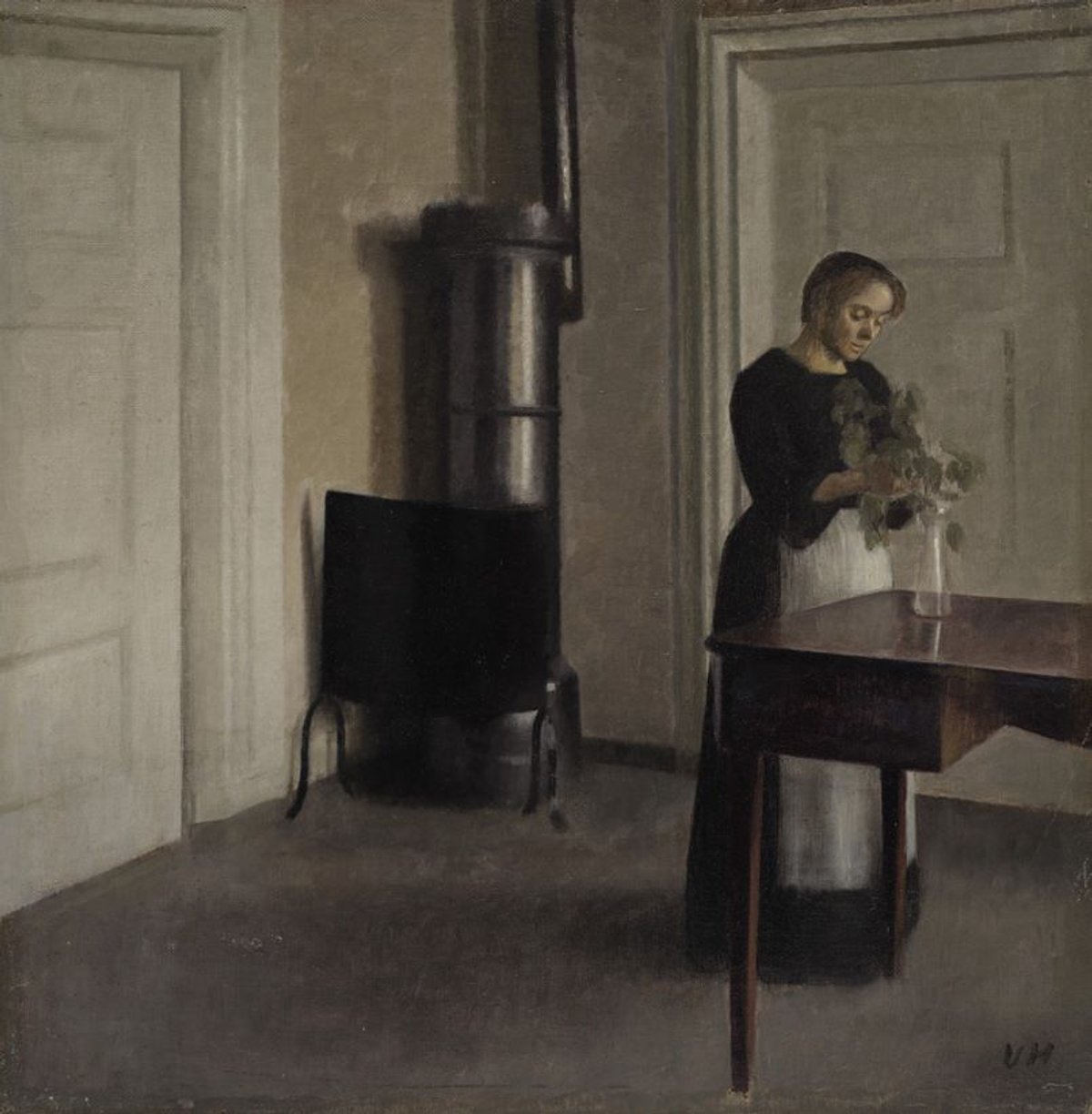 Vilhelm Hammershøi, Intérieur avec femme disposant des branches dans un vase, 1900, huile sur toile, est. 1,5 - 2million(s) de livres sterling. © Phillips