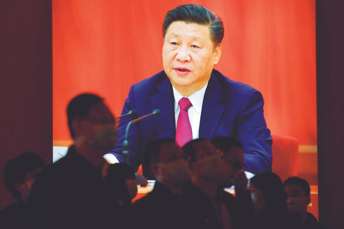 Portrait de Xi Jinping dans l’exposition « Forging Ahead in the New Era » à Pékin en septembre. REUTERS/Alamy Stock Photo