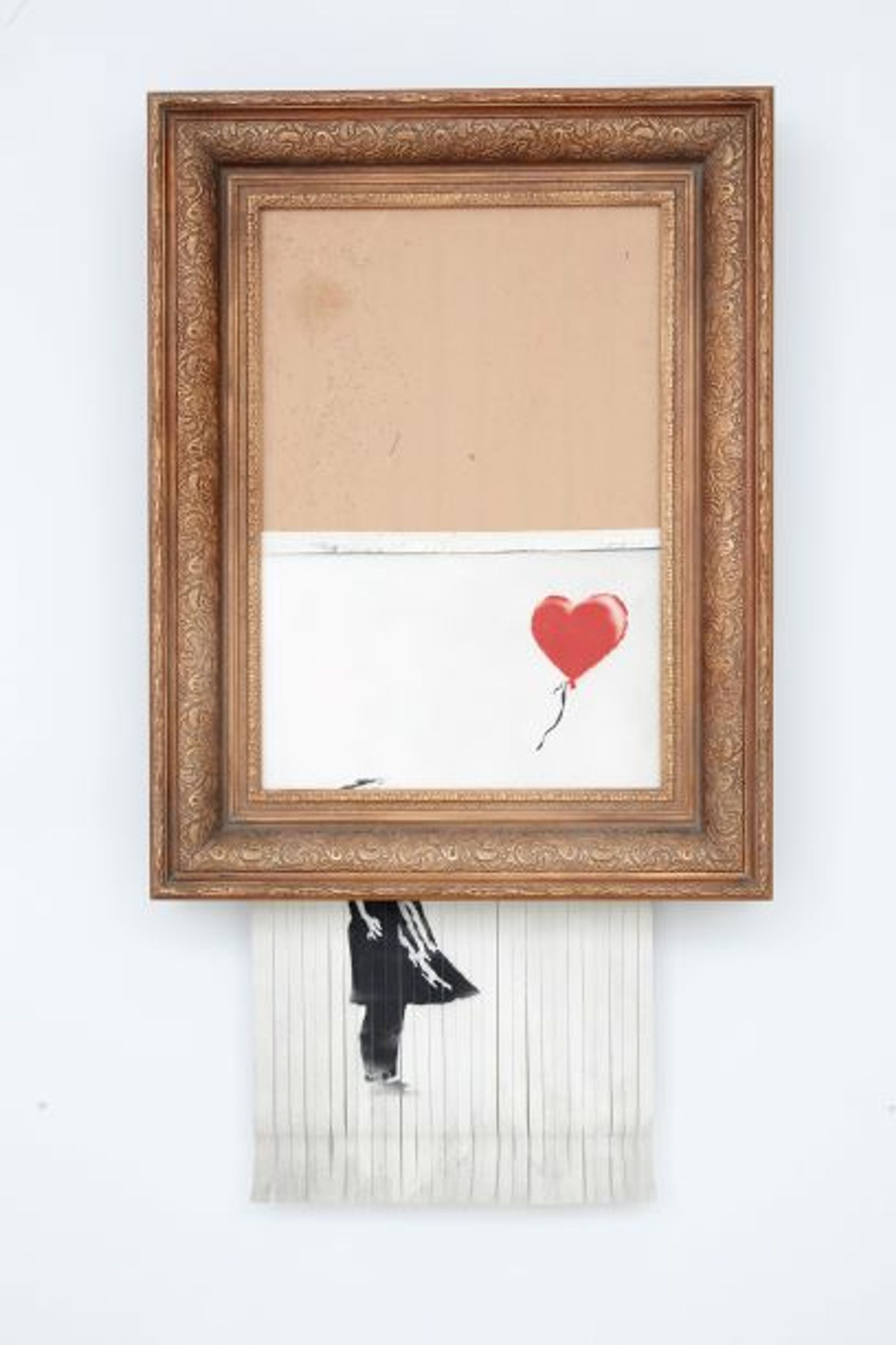 Banksy, Love is in the Bin, 2018, spray et acrylique sur toile montée sur panneau. © Sotheby’s