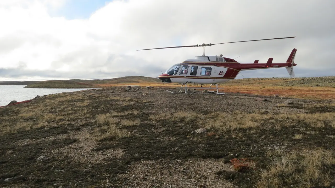 Helicopter landing in the tundra