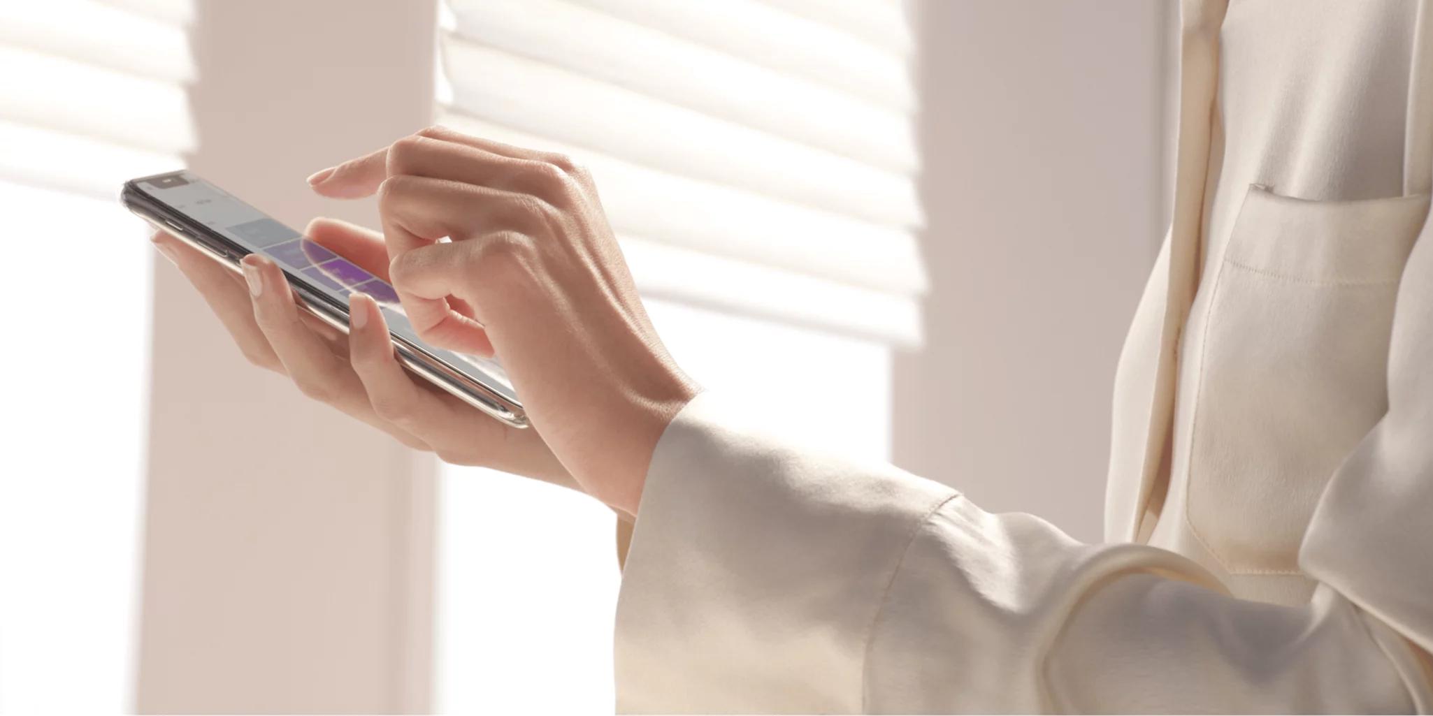 Woman using PowerView App