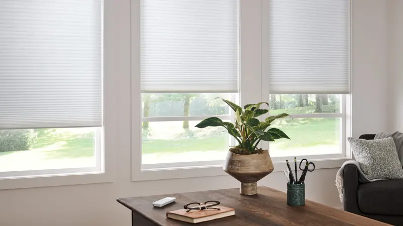 Motorized shades in a two-story foyer