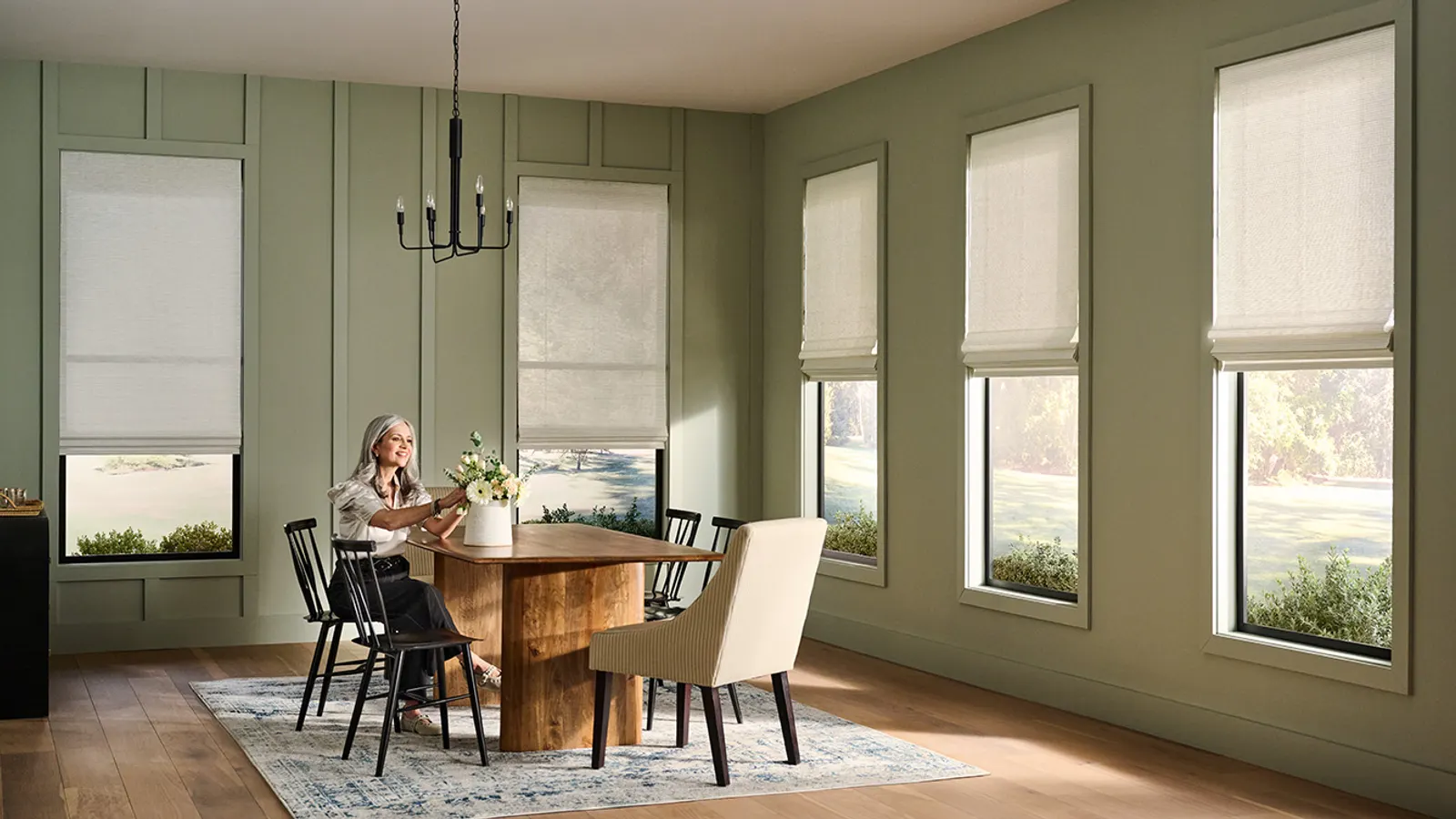Roman shades with soft folds in a living room
