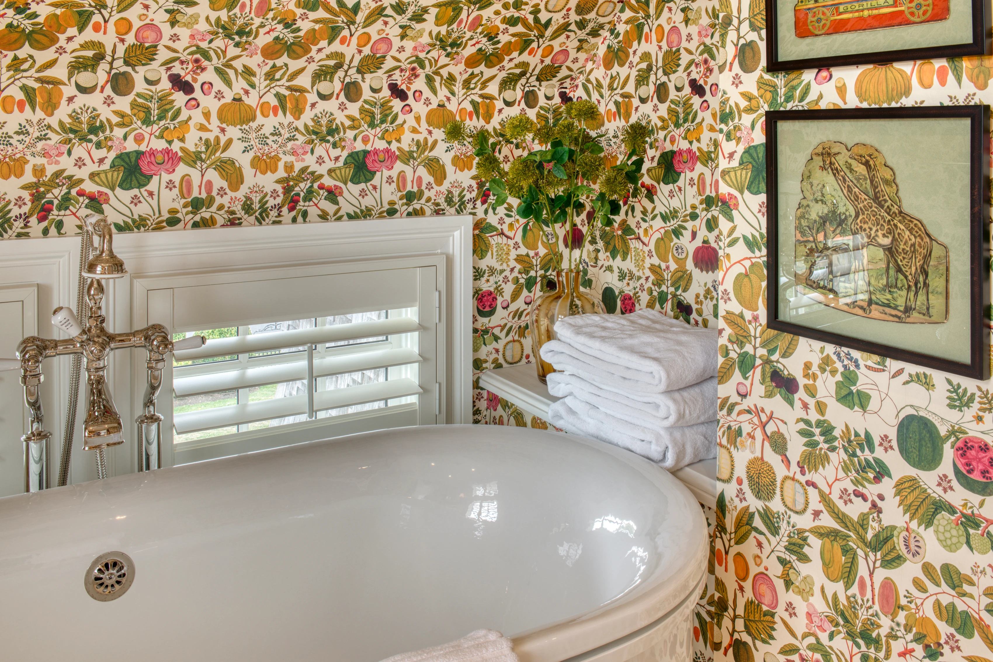 Bathroom windows with Hunter Douglas shutters.