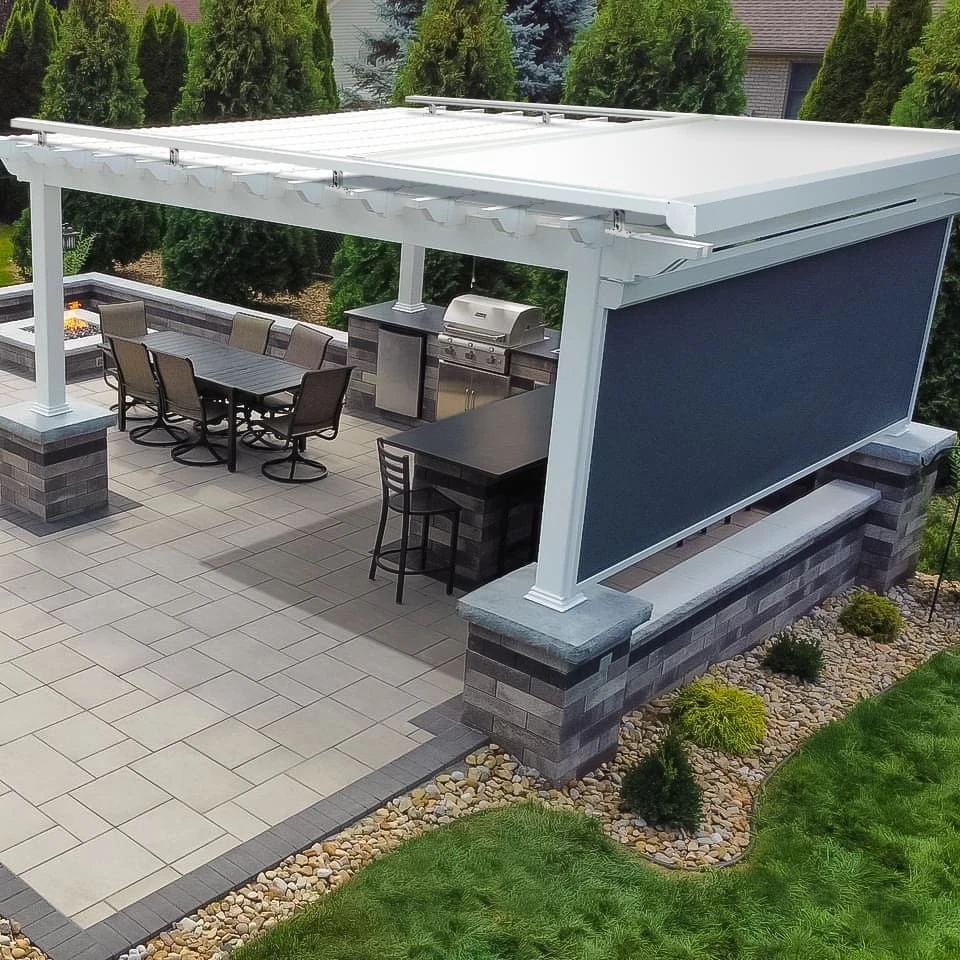 Outdoor shades, awnings, and enclosures by JM Windows.