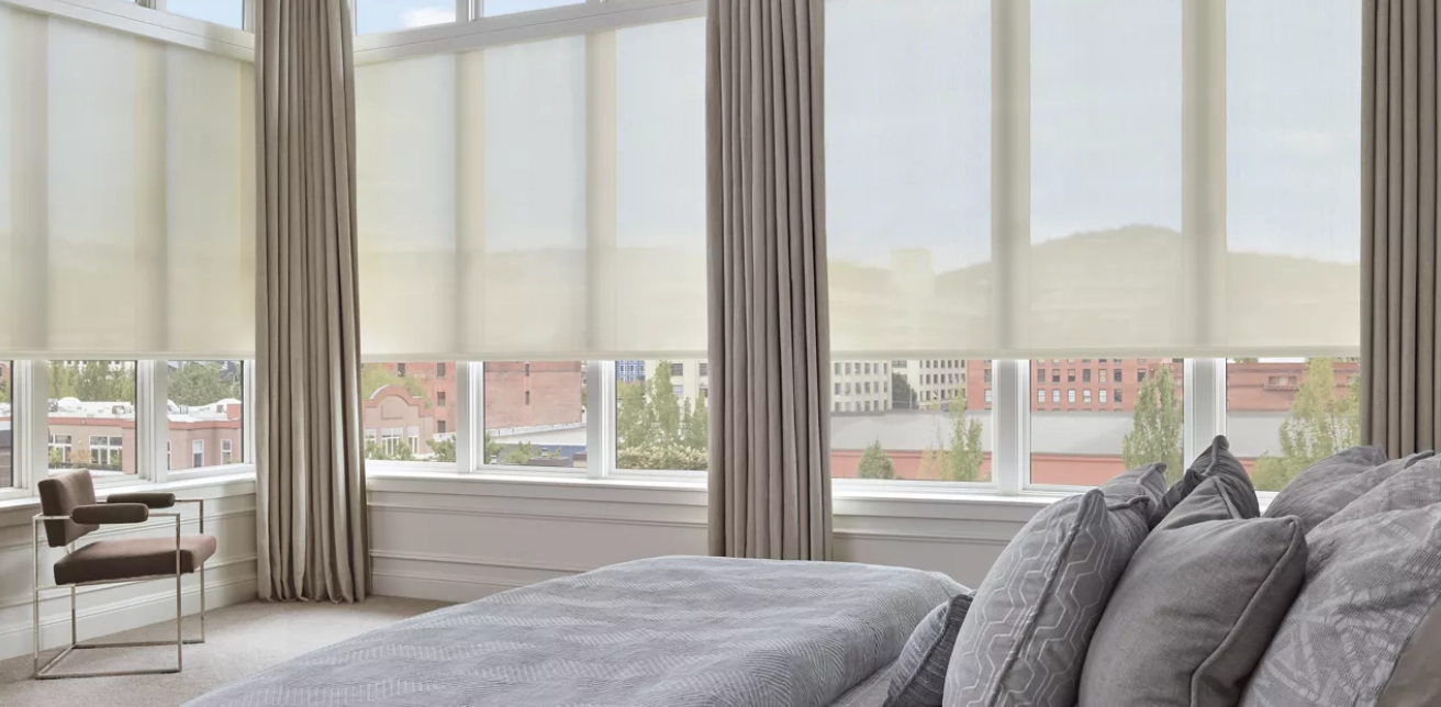 Designer Solar Shades covering a set of windows in a modern bedroom near Wexford, PA