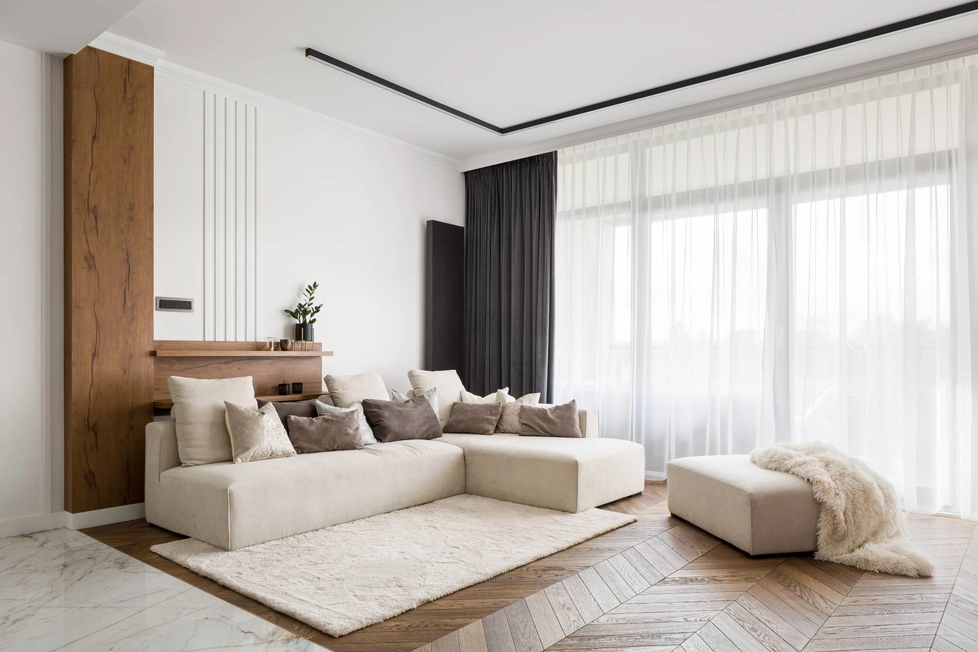 Elegant and neutral living room with modern drapery near Denver, CO