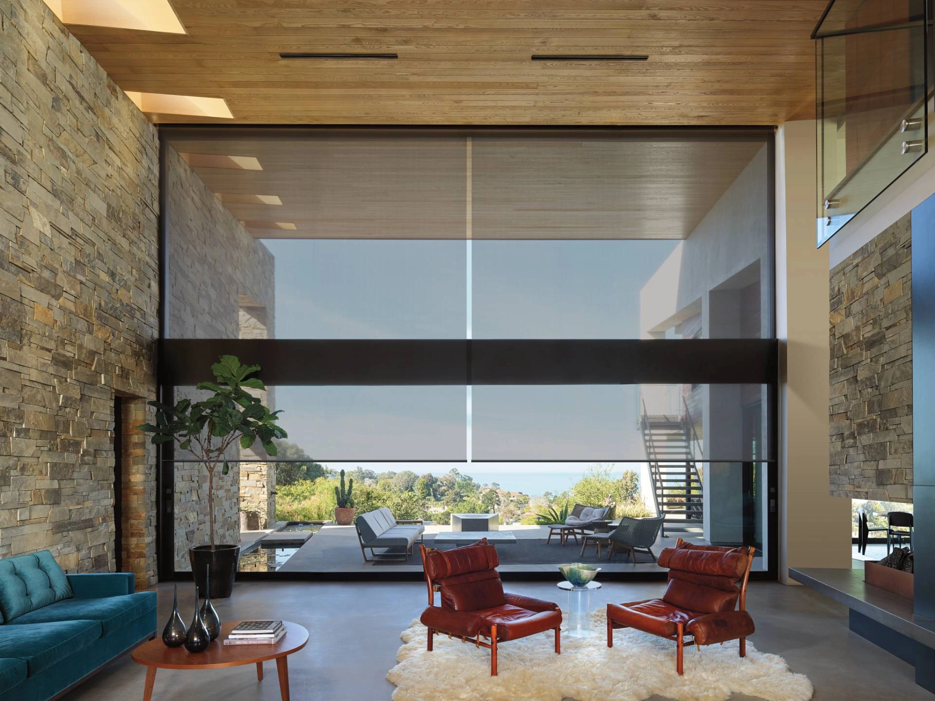 Designer Solar Shades offer clear views and UV protection for large windows.
