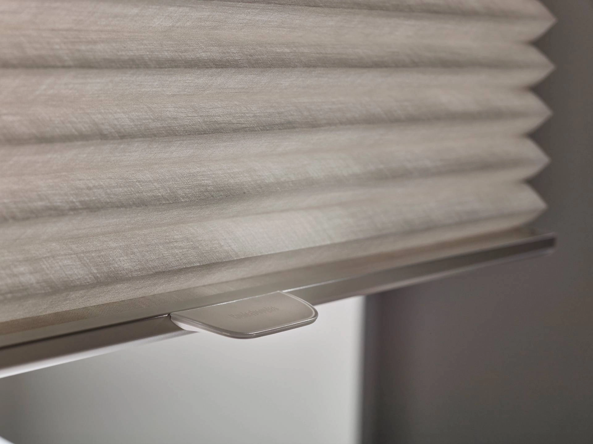 Hunter Douglas Duette® Cellular Shades covering a living room window near Norwalk, CT