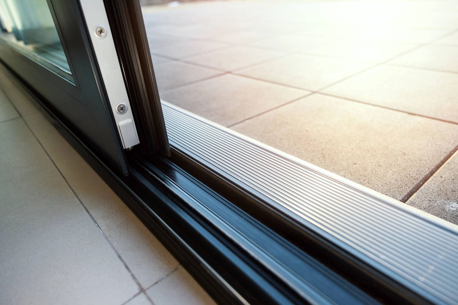 A close-up of a sliding glass door leading outside near Oklahoma City, Oklahoma (OK)