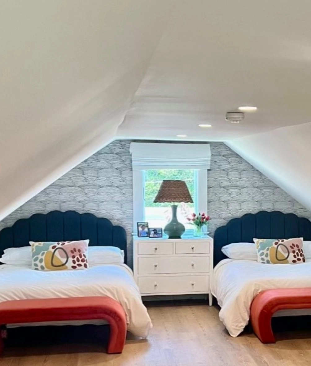 Roman shades in a bedroom window