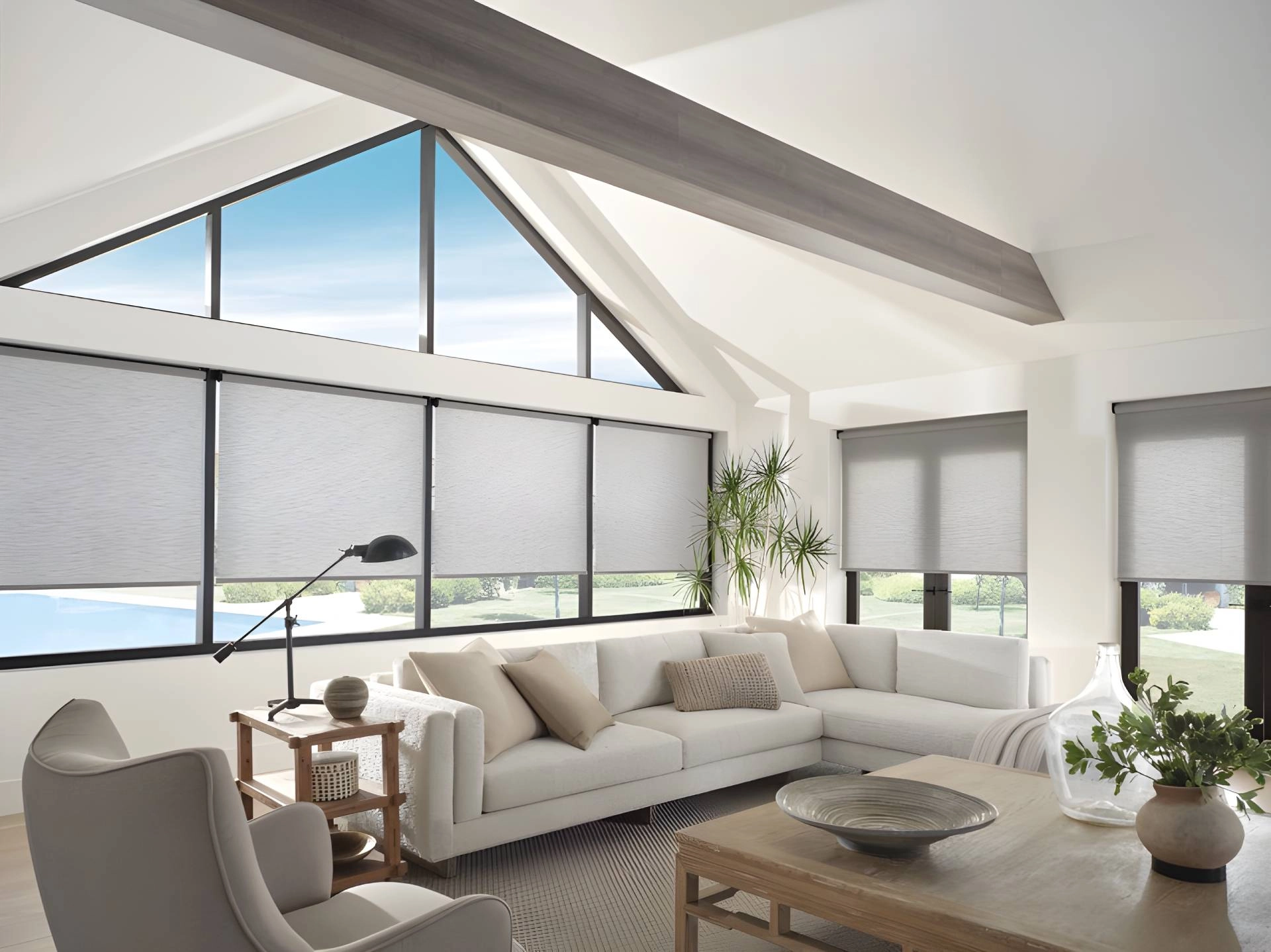 Large windows adorned with stunning Hunter Douglas Designer Solar Shades, a sunroom window treatment near Cambridge, MD