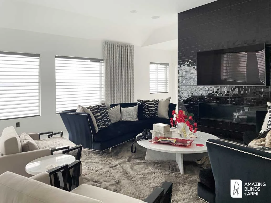 Living room windows with Hunter Douglas shades.