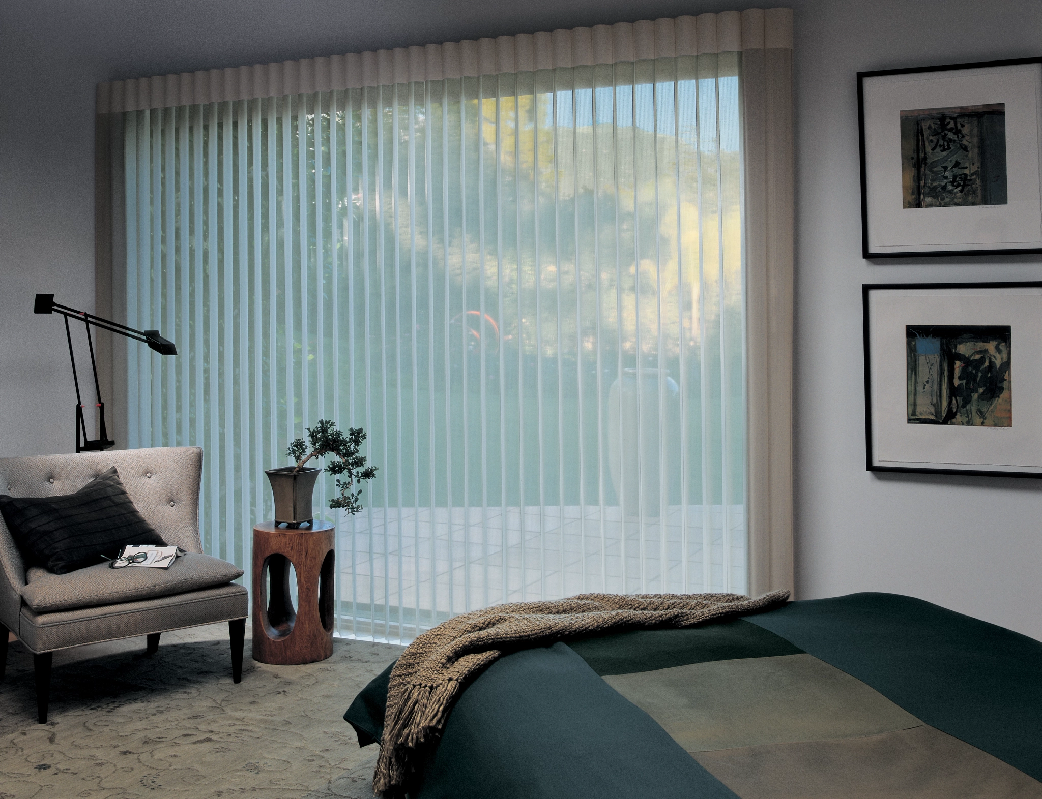 Hunter Douglas Luminette® Privacy Sheers covering a large bedroom window near Traverse City, MI