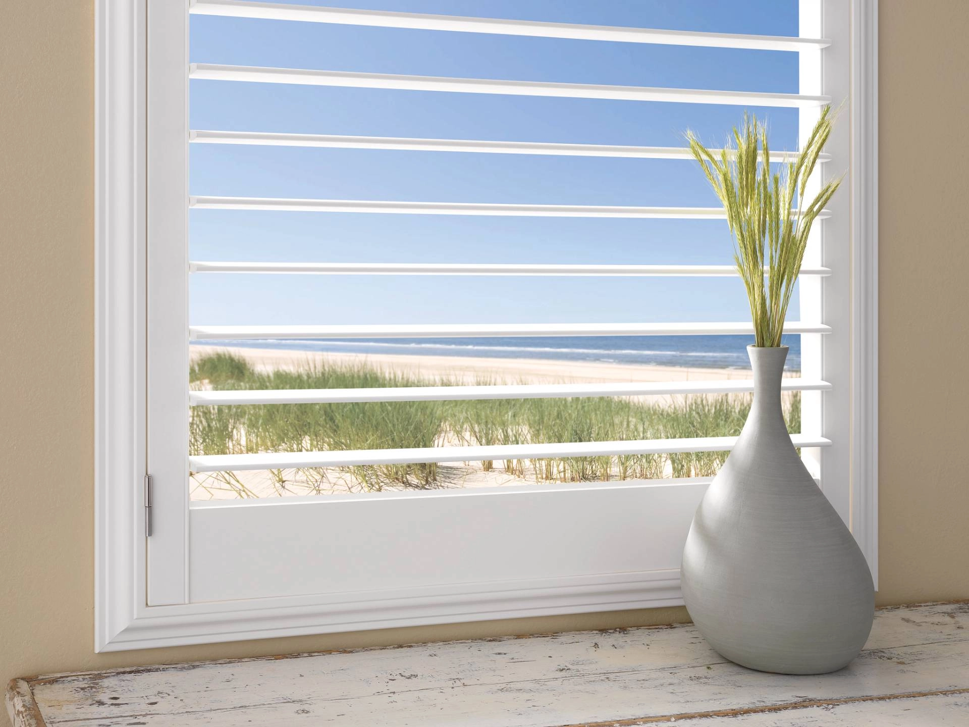 photo: 10025753-banner-living-by-the-water-best-coastal-window-treatments.jpg
