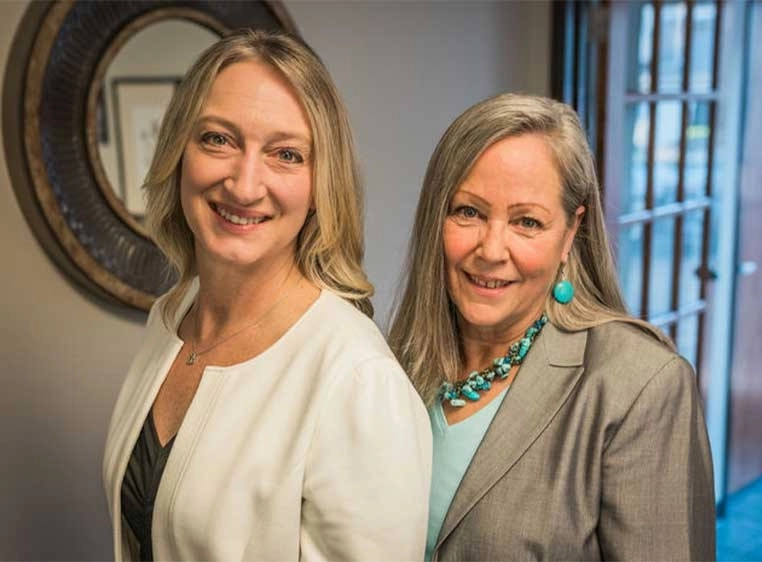 The owner and previous owner, Cindy and Gretchen.