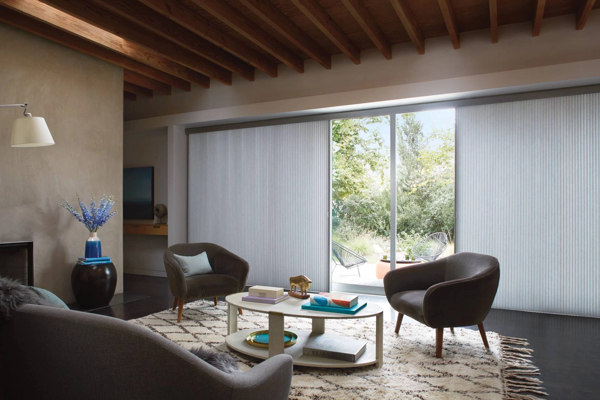 Hunter Douglas vertical Duette® Cellular Shades in a living room.