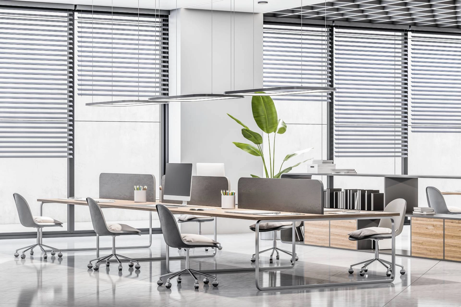 Modern office interior with blinds, panoramic city view, furniture and equipment near Kalaheo, Hawaii.
