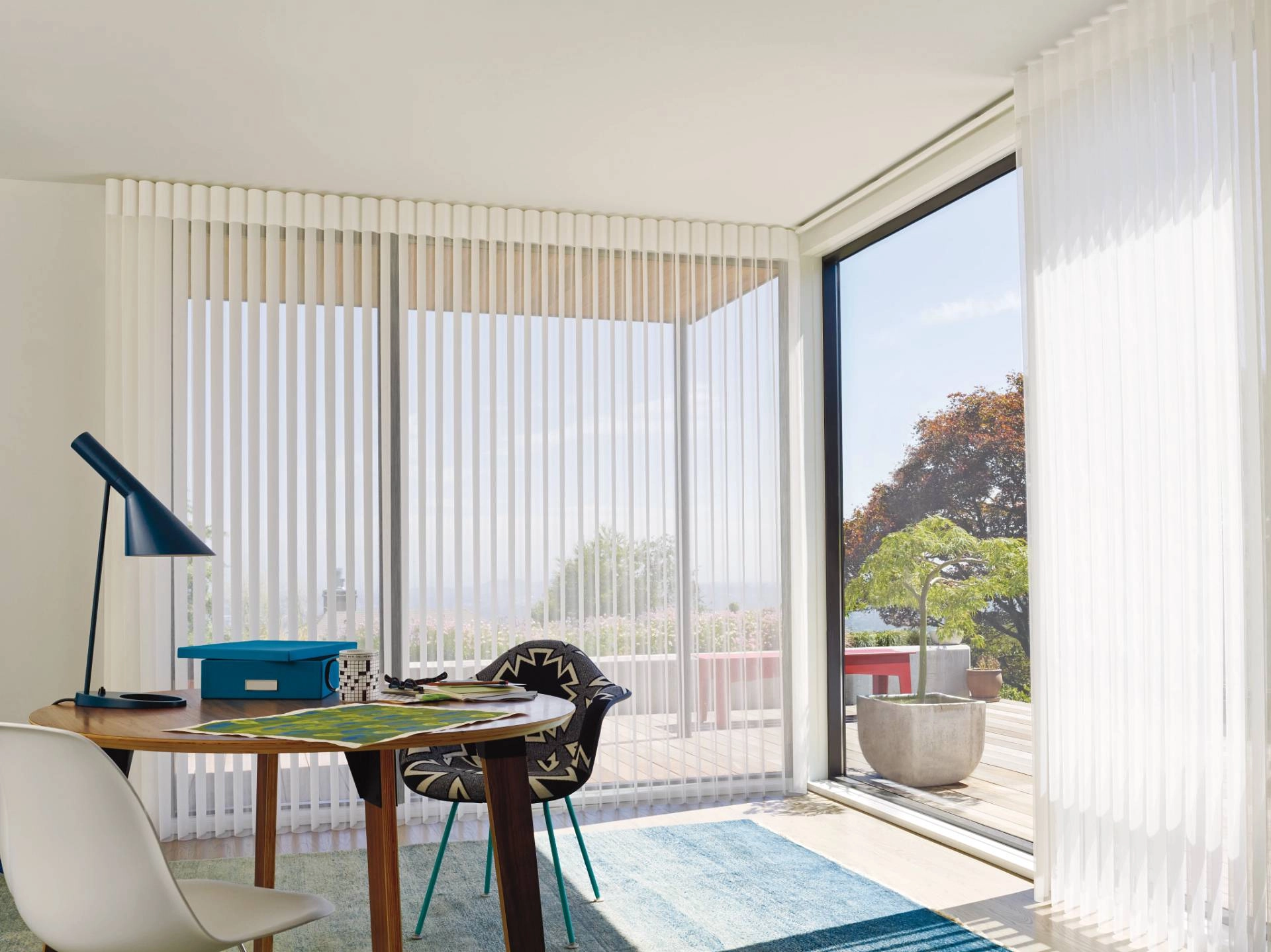 Hunter Douglas Luminette® Sheer Panels covering a sliding glass door in Tucson, AZ.