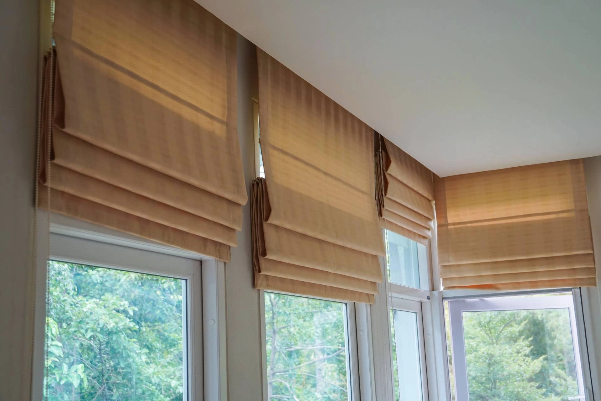photo: 10181343-banner-feature-vignette-modern-roman-shades.jpg