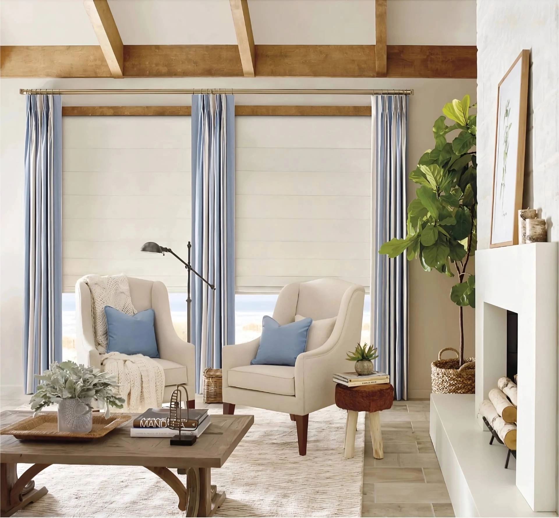 Roman shades paired with drapery boost decor and add UV protection.