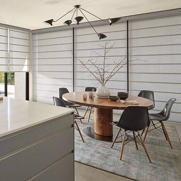 Dining Room with Hunter Douglas window coverings.