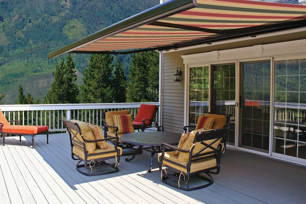 Outdoor shades, awnings, and enclosures by JM Windows.