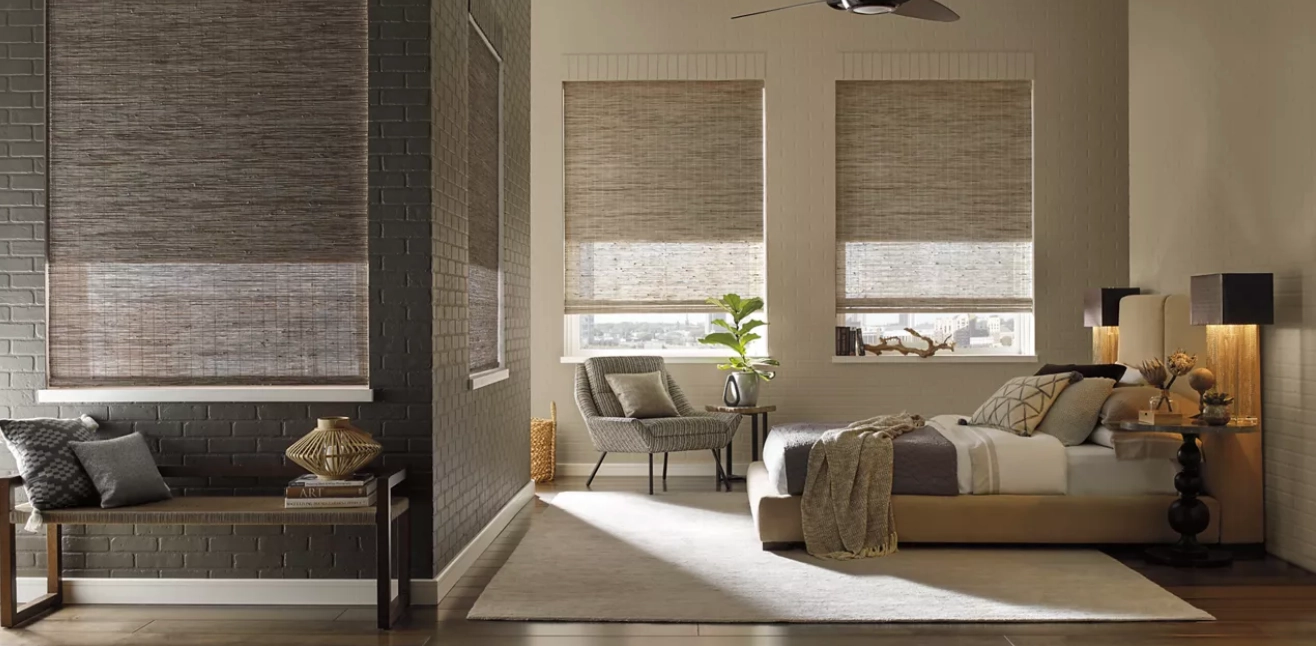 Hunter Douglas Provenance® Woven Wood Shades in a bedroom.
