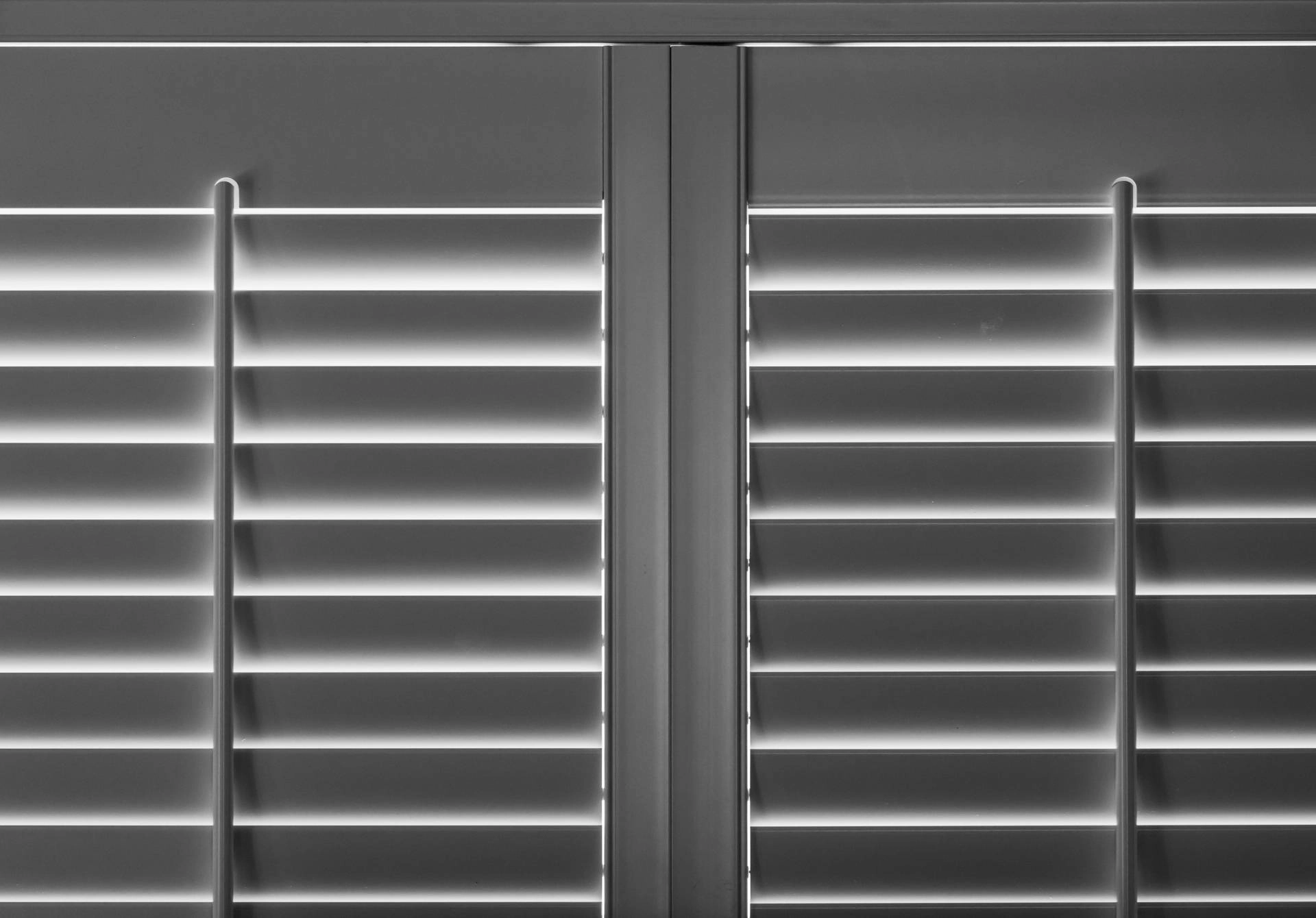 Interior shutters with the louvers closed to block the sunlight near Key West, (FL)
