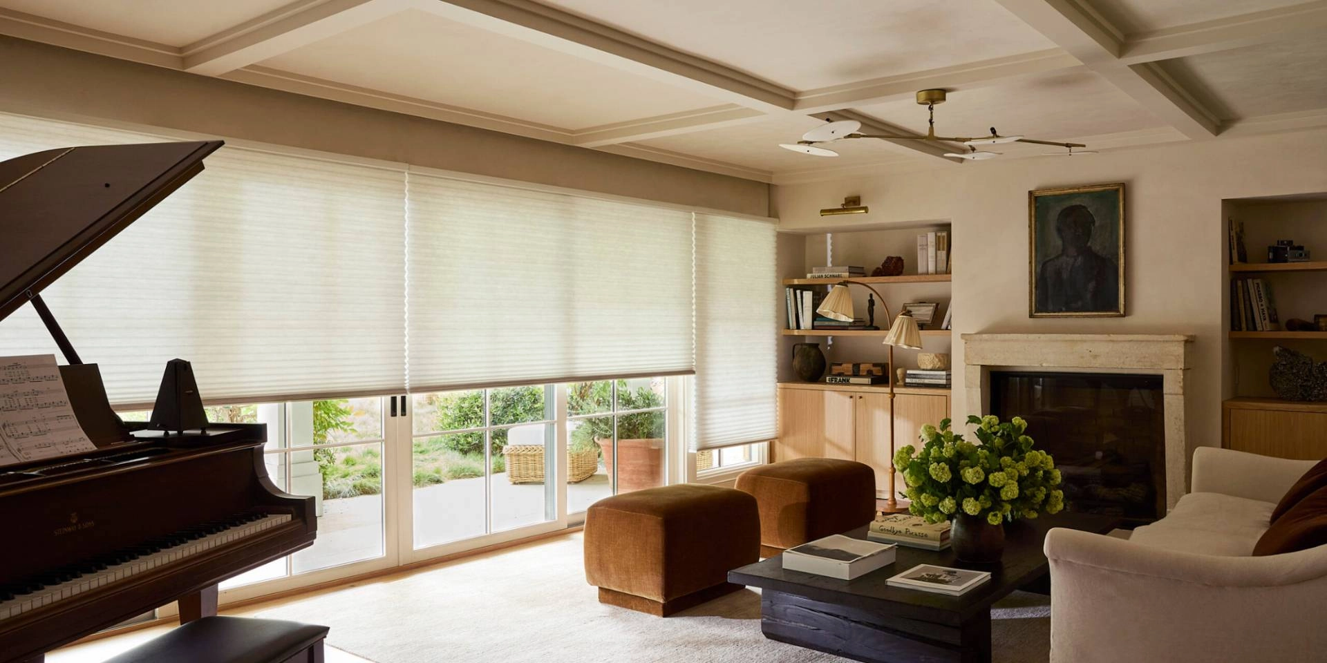 Hunter Douglas Duette® Cellular Shades, to help with energy efficiency, on large living room windows
