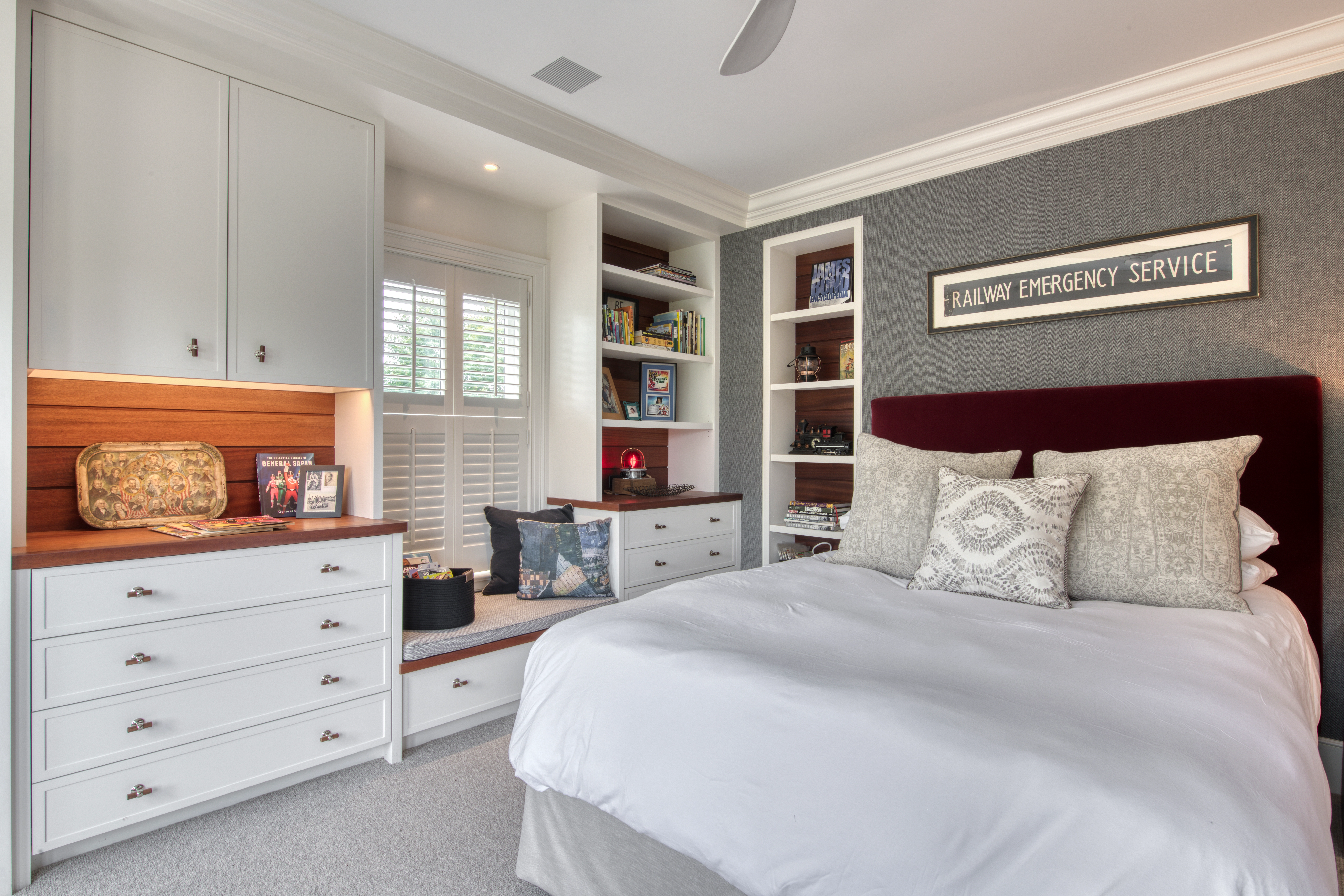 Bedroom windows with shades.