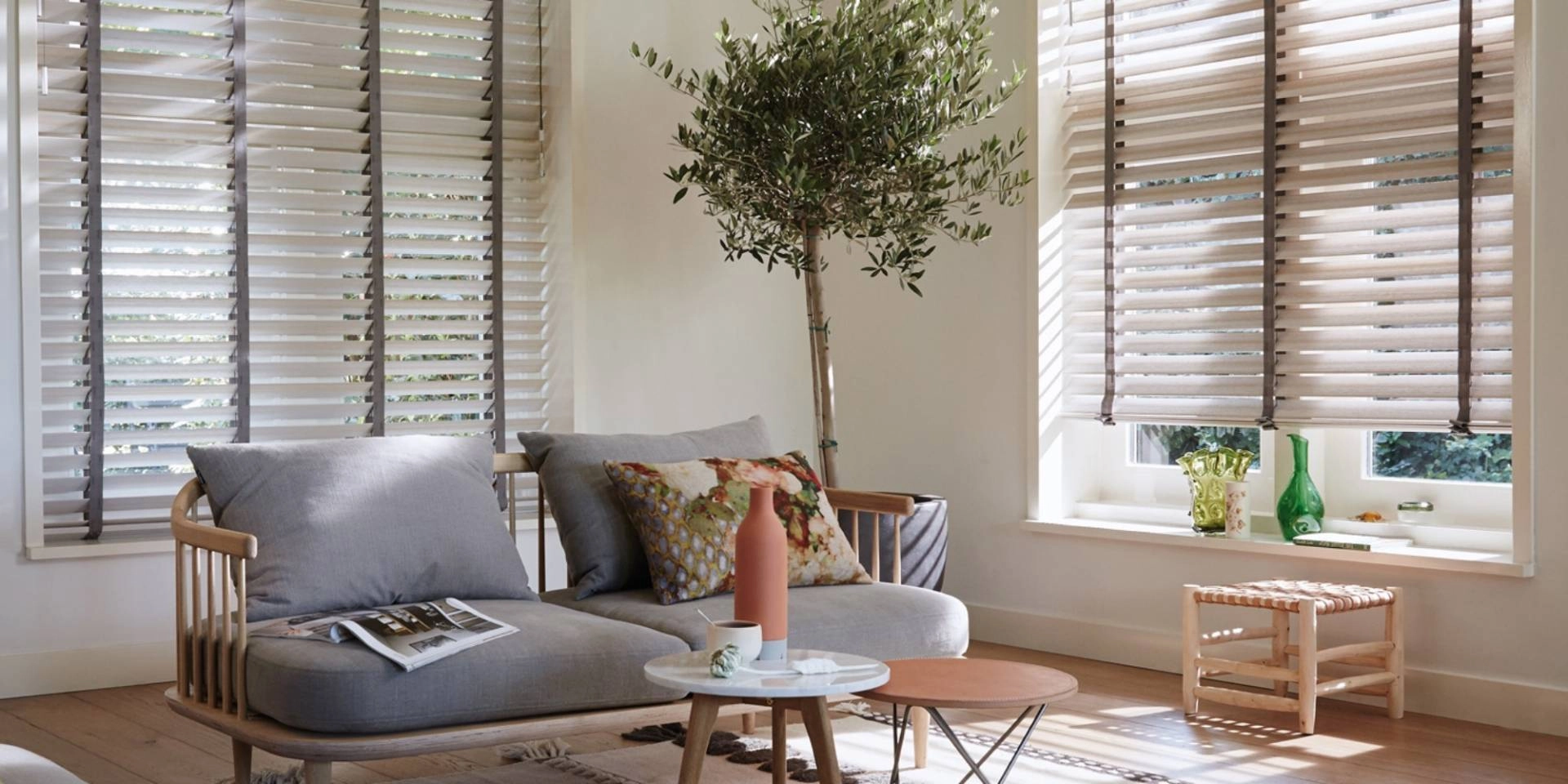 Hunter Douglas Parkland® Wood Blinds as custom window blinds in a chic living room